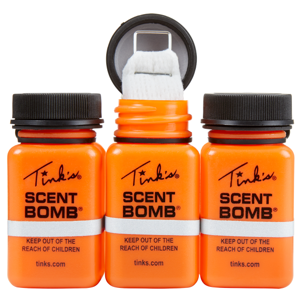 three bottles, centre one open with wick - W5841